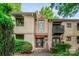 Charming condo with a private balcony and well-maintained landscaping at 201 N Dotger Ave # C8, Charlotte, NC 28207