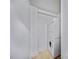 Compact laundry area with stacked washer and dryer units for space-saving convenience at 201 N Dotger Ave # C8, Charlotte, NC 28207