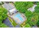 Aerial view of the pool and surrounding complex with lounge seating at 201 N Dotger Ave # C8, Charlotte, NC 28207