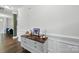Hallway features hardwood floors and stylish decorations at 2034 Houle Ln, Charlotte, NC 28214