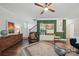 Inviting living room showcases a leather chair, stylish cabinet, and a decorative rug at 2034 Houle Ln, Charlotte, NC 28214