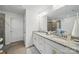 Bright bathroom featuring double sinks, granite countertop, and standup shower at 2034 Houle Ln, Charlotte, NC 28214