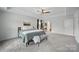 Spacious main bedroom with tray ceiling, ceiling fan, and carpet at 2034 Houle Ln, Charlotte, NC 28214