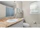 This bathroom offers a single sink vanity, toilet, mirror, and shower/tub combo at 209 Mcfadden St, Rock Hill, SC 29730