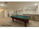 Spacious, staged basement featuring a pool table and bar area at 228 31St Avenue Ne Ct, Hickory, NC 28601