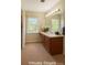Bathroom featuring a spacious vanity with double sinks and large mirror at 228 31St Avenue Ne Ct, Hickory, NC 28601