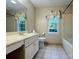 Bright bathroom featuring a vanity, toilet and shower-tub combo at 228 31St Avenue Ne Ct, Hickory, NC 28601