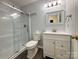 Well-lit bathroom featuring a glass-enclosed shower and neutral walls at 228 31St Avenue Ne Ct, Hickory, NC 28601