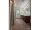 Bathroom featuring a spacious vanity with double sinks and large mirror at 228 31St Avenue Ne Ct, Hickory, NC 28601