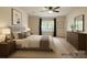 This primary bedroom is virtually staged and has lots of natural light at 228 31St Avenue Ne Ct, Hickory, NC 28601