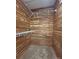 Well-organized closet with cedar paneling and white shelving at 228 31St Avenue Ne Ct, Hickory, NC 28601