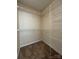 Walk-in closet with white wire shelving and neutral walls at 228 31St Avenue Ne Ct, Hickory, NC 28601