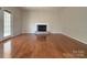 Spacious living room with hardwood floors and fireplace at 228 31St Avenue Ne Ct, Hickory, NC 28601