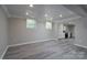 Large, updated basement with an open floorplan and access to a kitchen at 2617 Shady Lane Ave, Concord, NC 28027