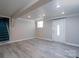 Finished basement with updated floors, recessed lighting, and a separate stairway at 2617 Shady Lane Ave, Concord, NC 28027