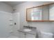 Updated bathroom featuring a shower/tub combo, new vanity, and modern fixtures at 2617 Shady Lane Ave, Concord, NC 28027