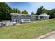 This property has a large yard, a charming patio, and a welcoming facade at 2617 Shady Lane Ave, Concord, NC 28027