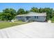 This home has a long driveway, a well manicured lawn, and a cozy facade at 2617 Shady Lane Ave, Concord, NC 28027