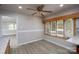 Bright kitchen nook featuring wood cabinets, granite counters, stainless appliances, updated flooring and a large window at 2617 Shady Lane Ave, Concord, NC 28027
