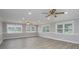 Spacious living room featuring recessed lighting, crown molding, and natural light with modern flooring, with three windows at 2617 Shady Lane Ave, Concord, NC 28027