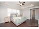 Bright bedroom with neutral decor, dark hardwood floors, and an en suite bathroom at 282 Auburn View Rd, Rock Hill, SC 29730