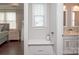 A hallway niche featuring a built-in desk sits between a bedroom and bathroom at 282 Auburn View Rd, Rock Hill, SC 29730