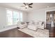 Cozy living room with dark wood floors, comfortable seating, and plenty of natural light at 282 Auburn View Rd, Rock Hill, SC 29730