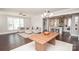Open-concept living room with dark wood floors, light gray paint and access to kitchen at 282 Auburn View Rd, Rock Hill, SC 29730