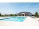 A community pool invites with crystal blue waters and ample lounging space under a clear sky at 282 Auburn View Rd, Rock Hill, SC 29730