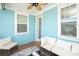 Inviting covered porch with comfortable seating and bright blue siding, perfect for relaxation at 282 Auburn View Rd, Rock Hill, SC 29730