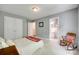 Bedroom with rocking chair, private access to full bathroom, and closet at 288 Sand Paver Way # 50, Fort Mill, SC 29708
