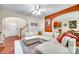 Open-concept living room showcasing hardwood floors, a comfortable sectional sofa, and seamless flow into the kitchen at 288 Sand Paver Way # 50, Fort Mill, SC 29708
