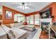 Inviting living room with a fireplace, comfortable seating, and a view of the dining area, creating a welcoming space at 288 Sand Paver Way # 50, Fort Mill, SC 29708