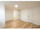 Finished basement bedroom with wood flooring, neutral walls, and closet at 301 Carolina Blvd, Salisbury, NC 28146