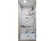 Elegant walk-in shower adorned with luxurious marble-patterned tile, creating a spa-like experience at 306 E Ratchford Ave, Gastonia, NC 28054