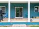 Relaxing back porch with sliding doors, outdoor seating, and 'For Sale' sign at 3103 Richview Dr, Crouse, NC 28033