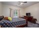 Bedroom with a window and a ceiling fan with overhead light at 3103 Richview Dr, Crouse, NC 28033