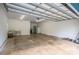 Spacious two car garage with white walls and an automatic door opener at 3103 Richview Dr, Crouse, NC 28033