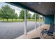 Covered front porch with blue ceiling, supporting columns and gravel driveway at 3103 Richview Dr, Crouse, NC 28033