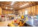 Spacious shed interior featuring high ceilings, a lawn mower, and ample workspace at 3103 Richview Dr, Crouse, NC 28033