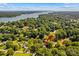 Aerial view featuring lake access with an arrow pointing to the property near the water at 315 Wood Duck Loop, Mooresville, NC 28117