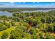 Aerial view featuring lake access with an arrow pointing to the property at 315 Wood Duck Loop, Mooresville, NC 28117