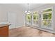 Dining room features hardwood floors, recessed lighting, and three windows with views at 315 Wood Duck Loop, Mooresville, NC 28117
