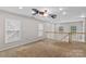 Spacious loft area with ample natural light from multiple windows and neutral carpet flooring at 315 Wood Duck Loop, Mooresville, NC 28117