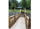 Beautiful waterfront home featuring a private dock and lush landscaping in a serene setting at 315 Wood Duck Loop, Mooresville, NC 28117