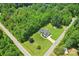 Aerial view of a lovely home surrounded by lush greenery, highlighting its expansive lot at 320 Bluegill Ln, Statesville, NC 28625