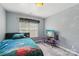 This bedroom has modern decor, great natural light, and ample space at 320 Bluegill Ln, Statesville, NC 28625