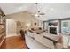 Bright living room features vaulted ceilings, a fireplace, and stylish contemporary furniture at 320 Bluegill Ln, Statesville, NC 28625