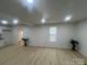 Open-concept living area featuring new floors, ample natural light, and neutral color palette at 39 E White St, Chester, SC 29706