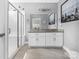 Tastefully designed bathroom with dual vanities, granite countertops, and a glass-enclosed shower at 3902 Mcgee Point Rd, Terrell, NC 28682